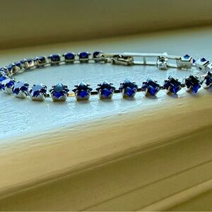 NWT Pretty Bird Jewelry white gold plated Bracelet with Blue Stones and extender